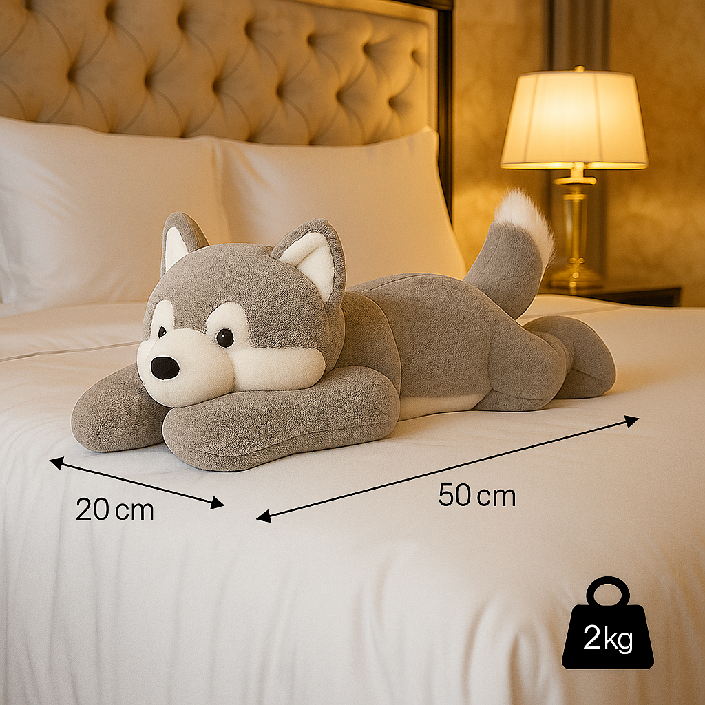 Verzwaringsknuffel van 2 kg in de vorm van een hond, inclusief productafmetingen op een bed