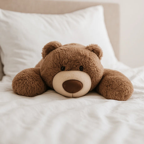 Verzwaringsknuffel op bed