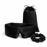 Vooraanzicht van zijden bundel zwarte scrunchie en zwarte slaapmasker, inclusief bijpassend zakje