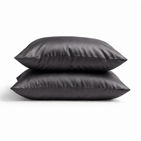 twee zijden kussenslopen donkergrijs liggend op elkaar